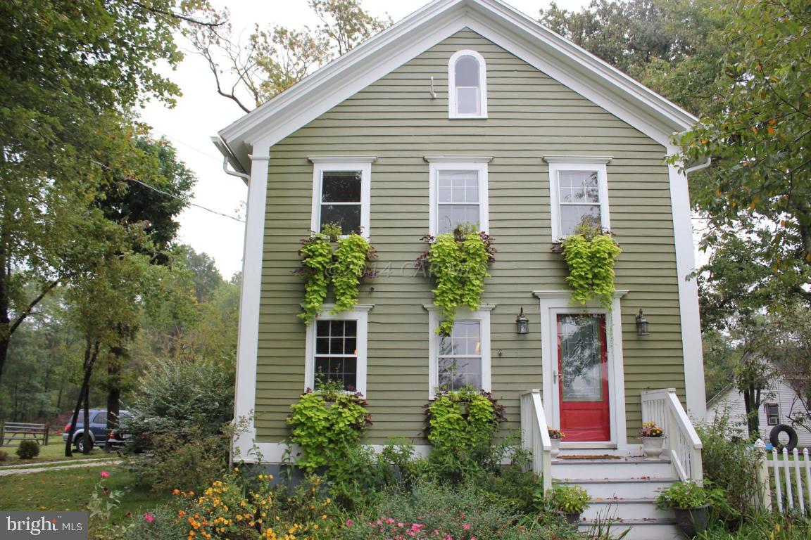 20633 Nanticoke Road Nanticoke, MD 21840 - Photo 44 of 46 a front view of a house with plants