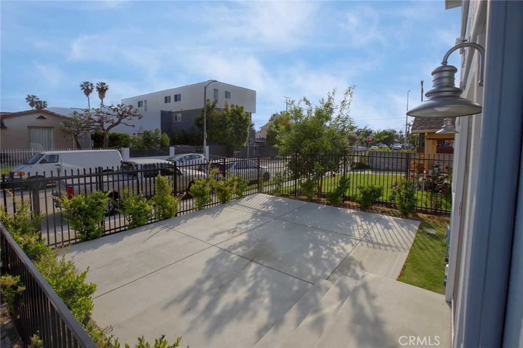 5459 Carlin Street, Unit 1 Los Angeles, CA 90016 - Photo 3 of 22 a view of a garden with sitting area