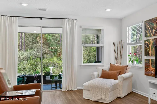a kitchen with stainless steel appliances a sink and a refrigerator