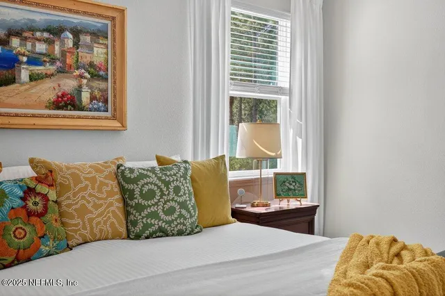 a view of a house with backyard and garden