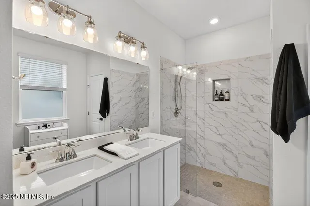 a backyard of a house with lots of green space and outdoor seating