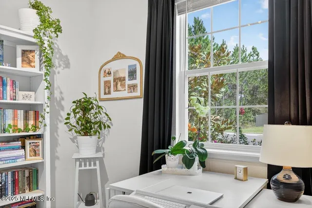 a bathroom with a sink vanity and a mirror