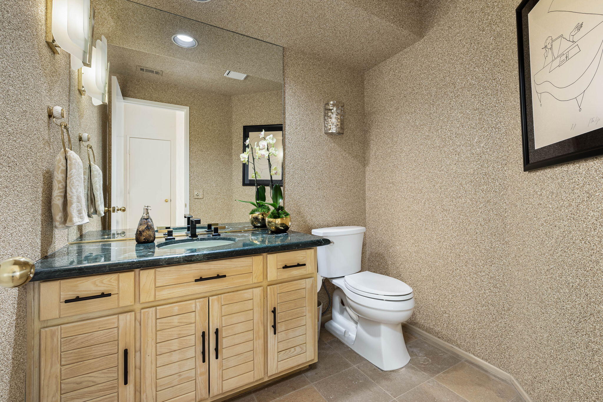 80449 Pebble Beach La Quinta, CA 92253 - Photo 58 of 60 a bathroom with a toilet sink and mirror