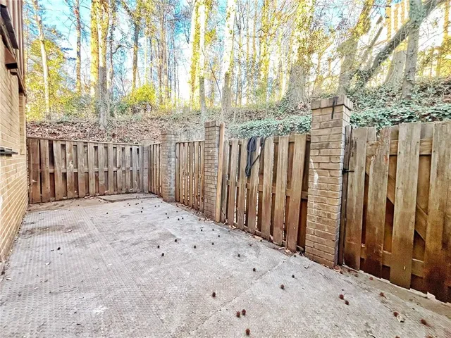 a view of hallway with wooden floor
