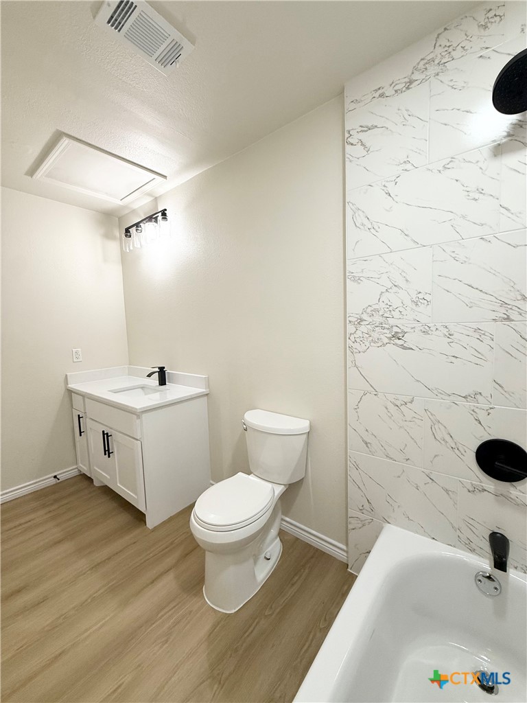 421 South 32nd Street Temple, TX 76501 - Photo 13 of 27 a bathroom with a sink and a toilet