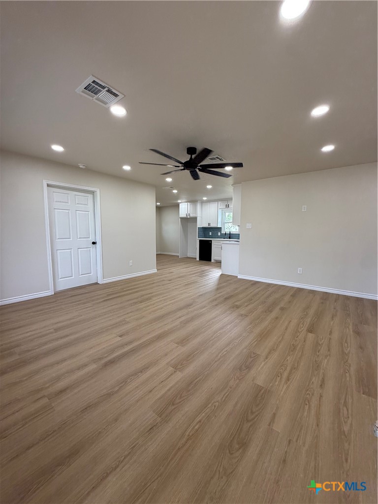 421 South 32nd Street Temple, TX 76501 - Photo 10 of 27 a view of empty room with wooden floor