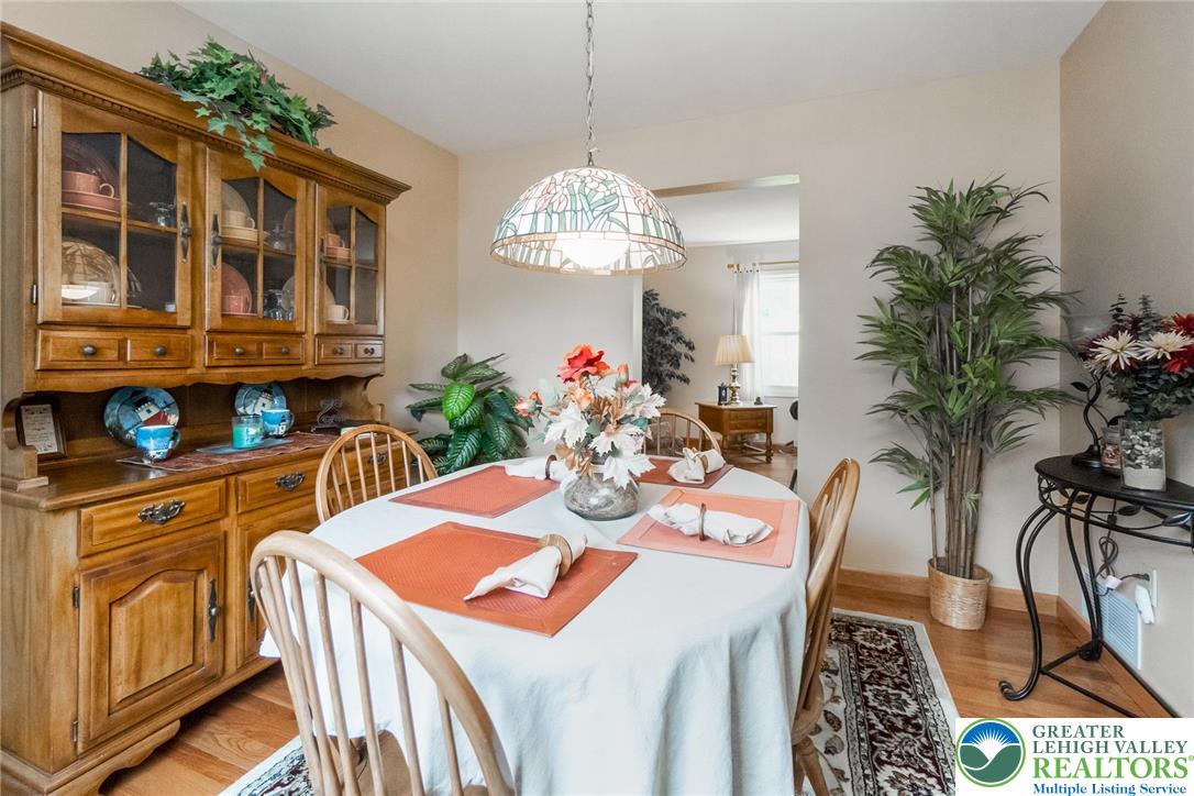 4759 Egypt Road Coplay, PA 18037 - Photo 13 of 30 a view of a dining room with furniture and chandelier