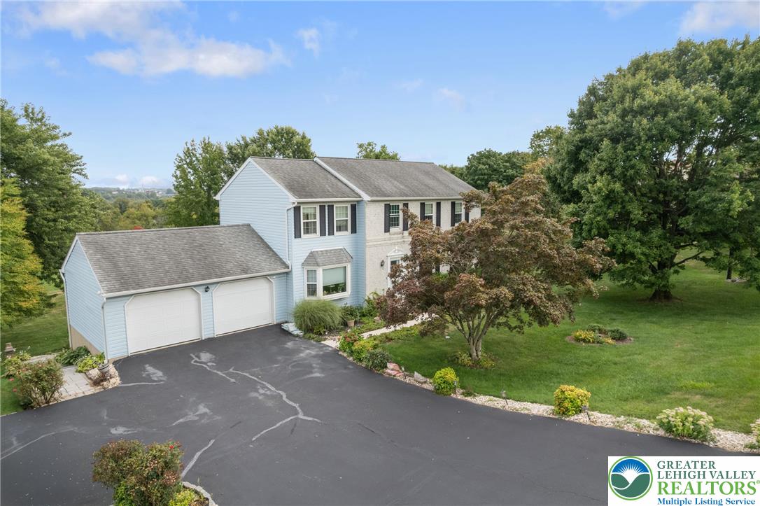 4759 Egypt Road Coplay, PA 18037 - Photo 2 of 30 a front view of a house with a garden and yard