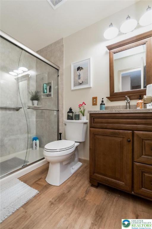 4759 Egypt Road Coplay, PA 18037 - Photo 21 of 30 a bathroom with a toilet a sink and a mirror