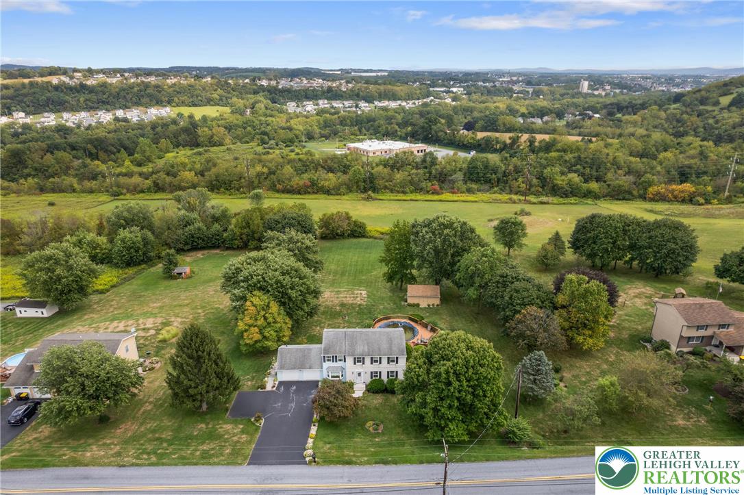 4759 Egypt Road Coplay, PA 18037 - Photo 3 of 30 an aerial view of residential building with outdoor space and lake view