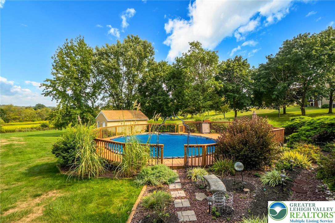 4759 Egypt Road Coplay, PA 18037 - Photo 8 of 30 a view of a garden with a house in the background