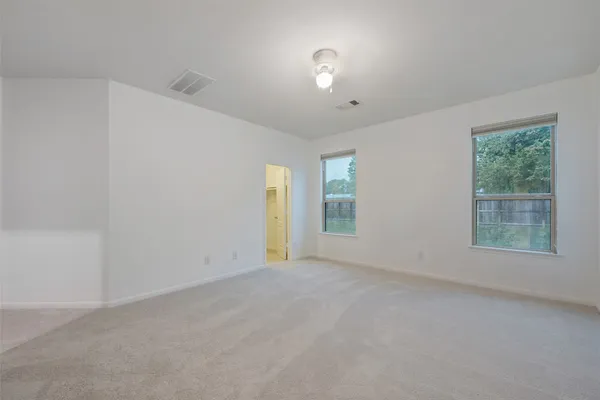 an empty room with windows