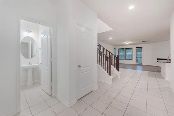 a view of a hallway with closet area