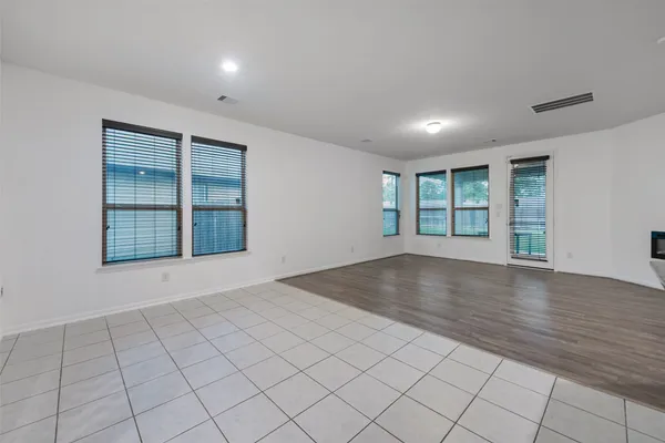 an empty room with windows