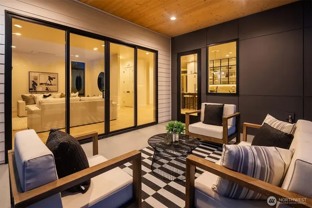 a living room with furniture and a window