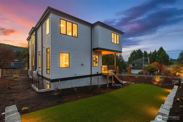 a view of a building with a yard