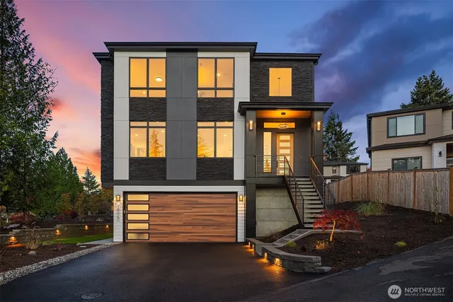 a view of a brick house with many windows