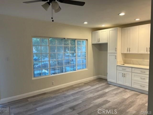237 West Wilson Avenue Orange, CA 92867 - Photo 2 of 8 a view of an empty room with window and cabinet