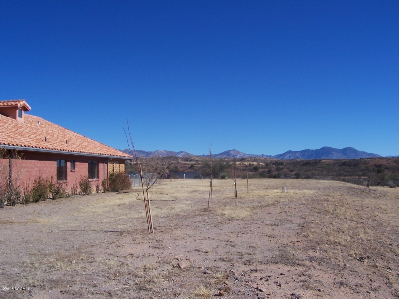 791 Camino Loma Rio Rico, AZ 85648 - Photo 10 of 13 a view of a yard with a house in the background