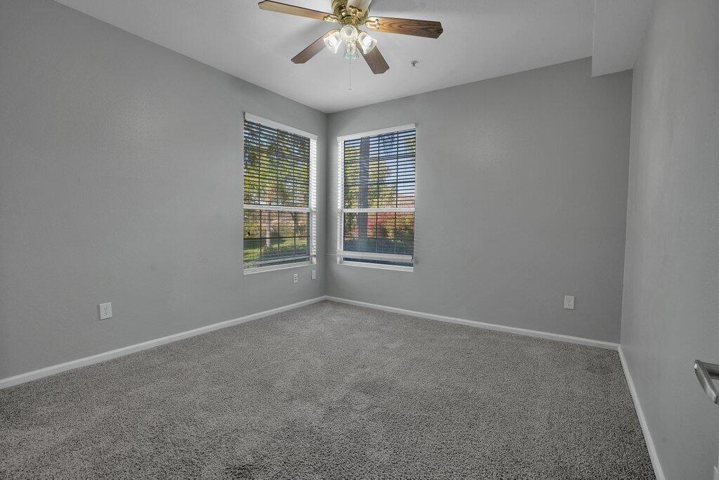 375 Central Avenue, Unit 10 Riverside, CA 92507 - Photo 13 of 33 a view of an empty room with a window