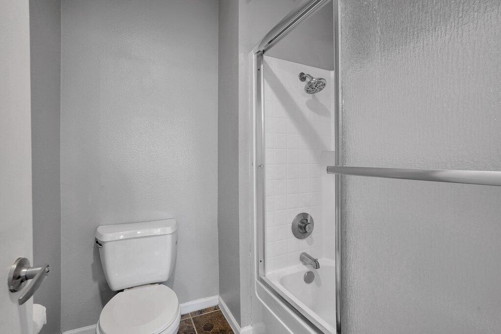 375 Central Avenue, Unit 10 Riverside, CA 92507 - Photo 18 of 33 a bathroom with a toilet and a shower
