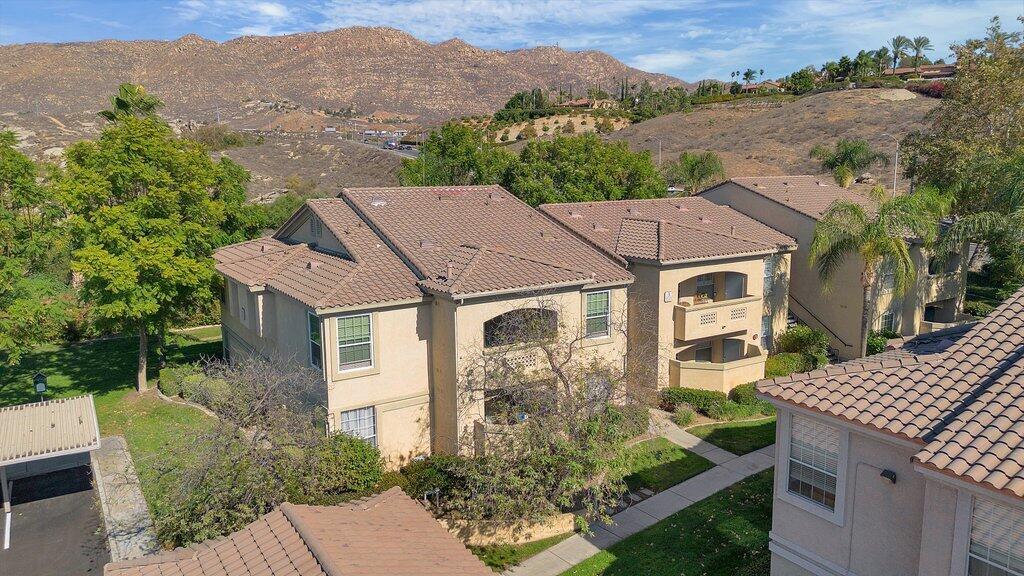 375 Central Avenue, Unit 10 Riverside, CA 92507 - Photo 28 of 33 an aerial view of a house with a yard