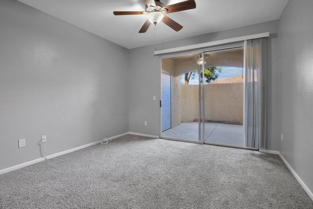 375 Central Avenue, Unit 10 Riverside, CA 92507 - Photo 3 of 33 an empty room with fan and windows