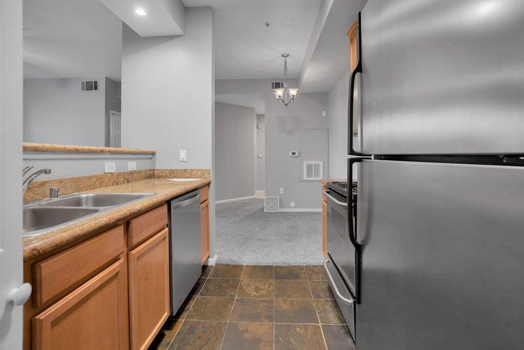 375 Central Avenue, Unit 10 Riverside, CA 92507 - Photo 7 of 33 a bathroom with a sink and a large mirror