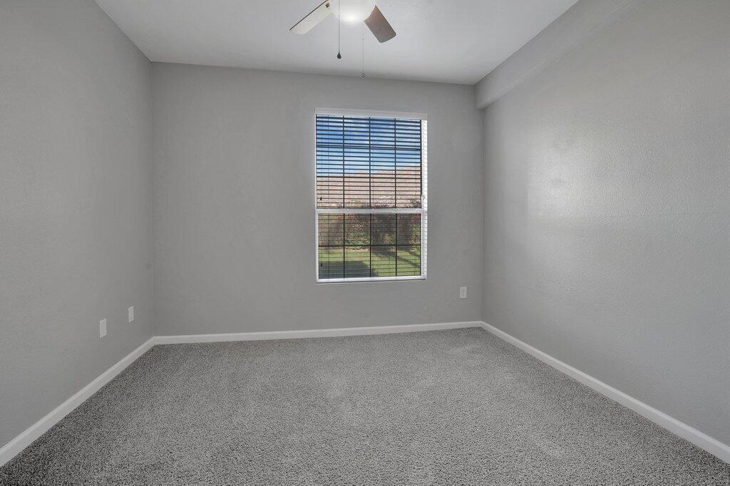 375 Central Avenue, Unit 10 Riverside, CA 92507 - Photo 10 of 33 an empty room with a window