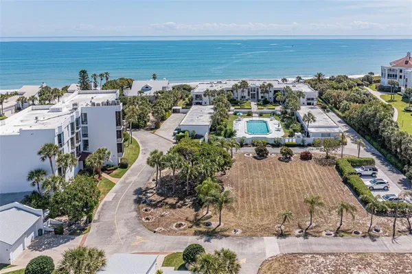 an aerial view of a building with outdoor space