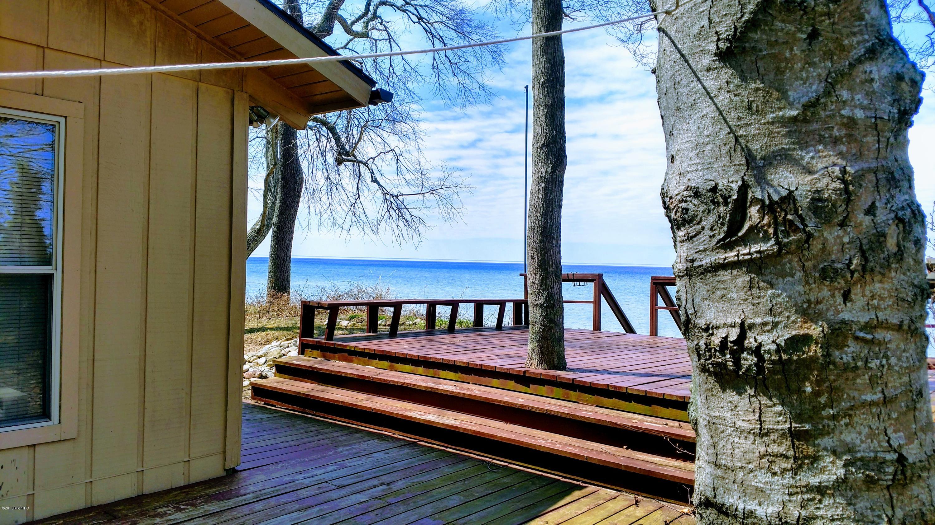 16806 Starkey Road Arcadia, MI 49613 - Photo 5 of 50 Lake Decking