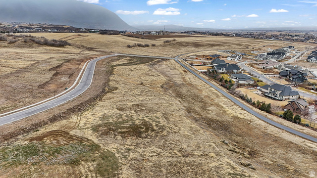 View of rural area with mountains and nearby suburban area