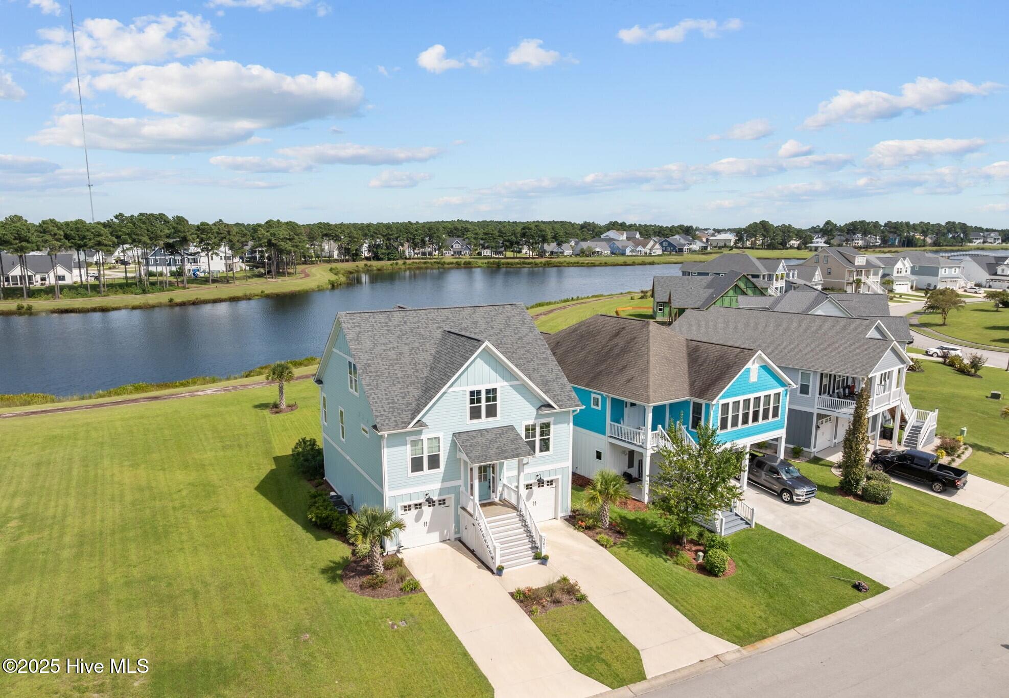 361 Summerhouse Drive Holly Ridge, NC 28445 - Photo 4 of 117 4-web-or-mls-DJI_20250826150400_0646_D