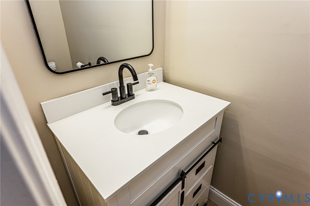 2806 Cove Ridge Road Midlothian, VA 23112 - Photo 21 of 52 White vanity with a single basin sink, matte black