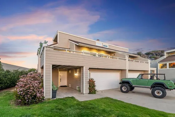 a view of a city with an ocean