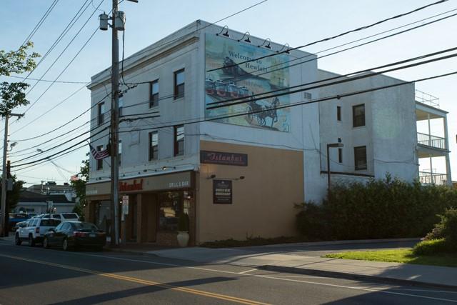 1230 Broadway, Unit 3 Hewlett, NY 11557 - Photo 1 of 23 a view of a building along the street