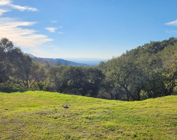 a view of an outdoor space and mountain view