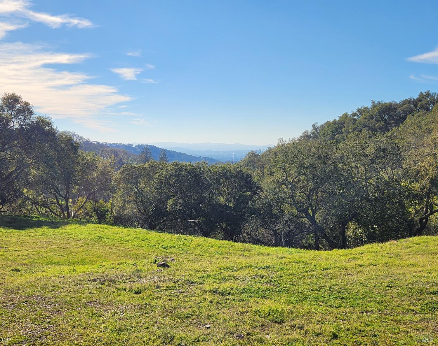 a view of an outdoor space and mountain view