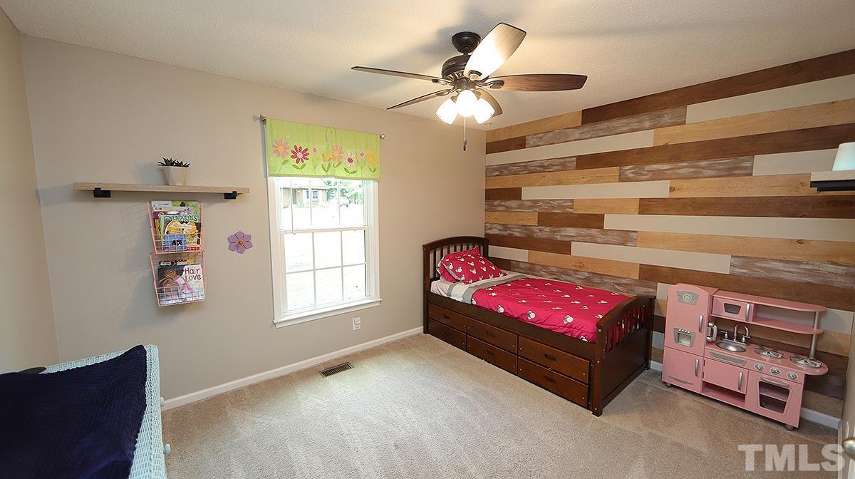 1706 Cranston Road Garner, NC 27529 - Photo 11 of 13 a living room with furniture and a window