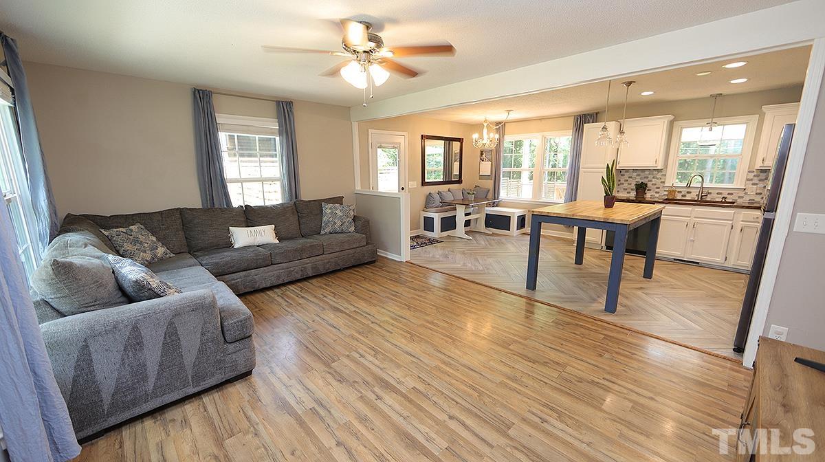 1706 Cranston Road Garner, NC 27529 - Photo 3 of 13 a living room with furniture and a large window