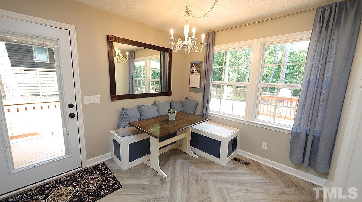 1706 Cranston Road Garner, NC 27529 - Photo 5 of 13 a living room with furniture and a window