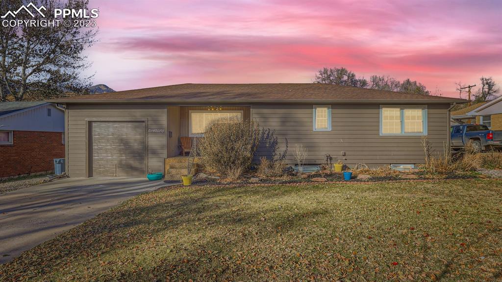 530 Valley Road Colorado Springs, CO 80904 - Photo 1 of 50 a front view of a house with two chairs