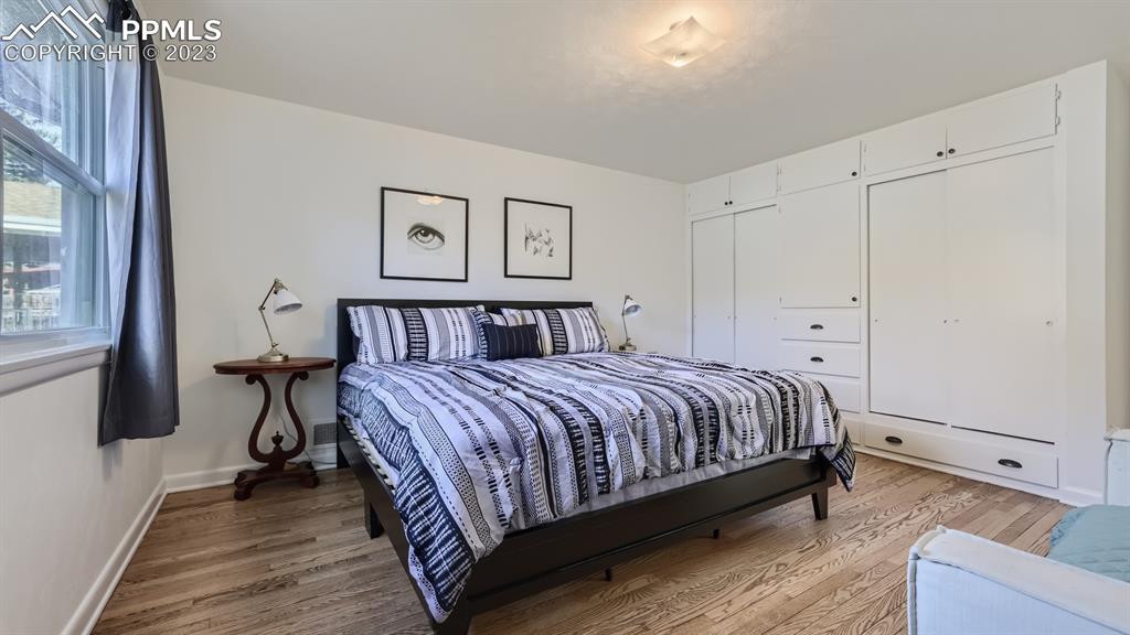 530 Valley Road Colorado Springs, CO 80904 - Photo 16 of 50 a bedroom with a bed and a window