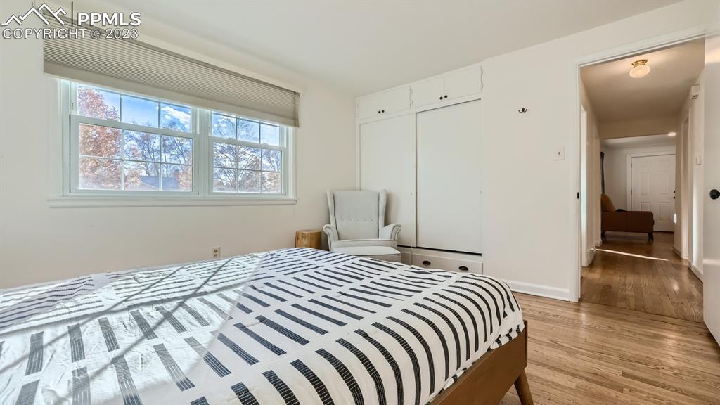 530 Valley Road Colorado Springs, CO 80904 - Photo 23 of 50 a bedroom with a bed and a window