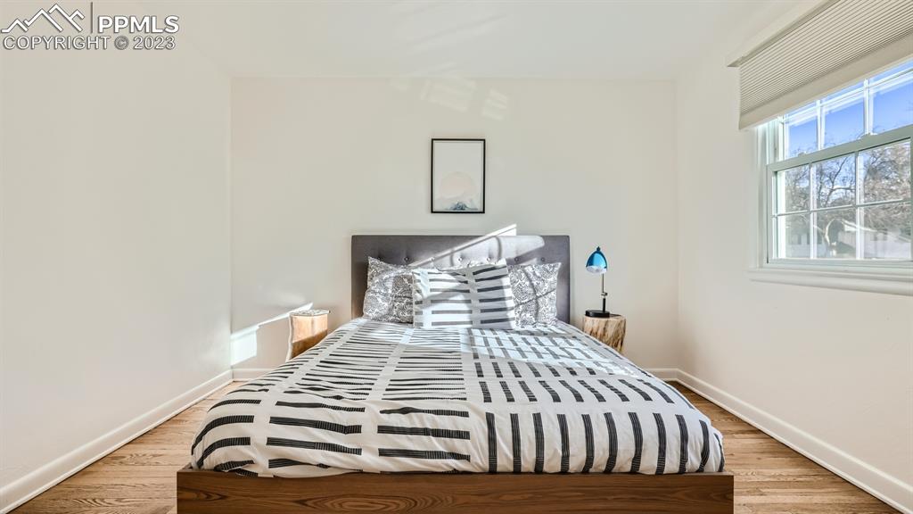 530 Valley Road Colorado Springs, CO 80904 - Photo 25 of 50 a bedroom with a bed and a window