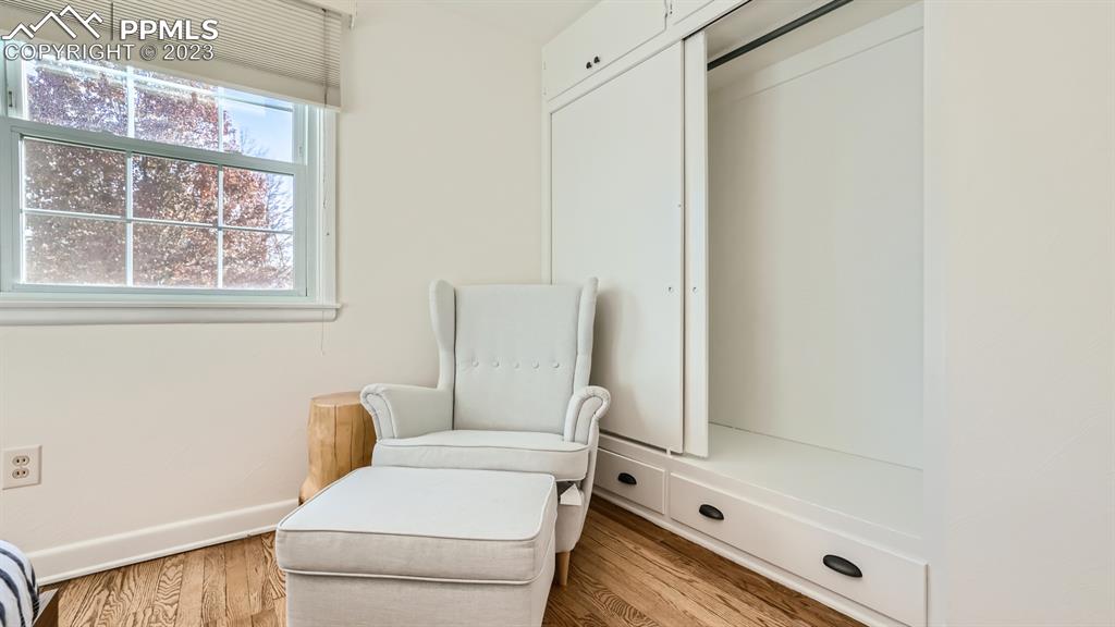 530 Valley Road Colorado Springs, CO 80904 - Photo 26 of 50 a bathroom with a toilet a sink and a mirror