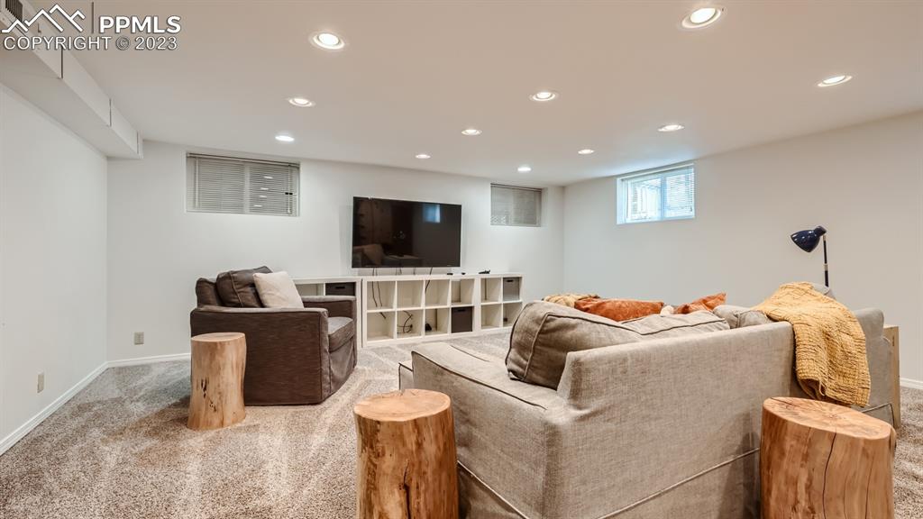 530 Valley Road Colorado Springs, CO 80904 - Photo 27 of 50 a living room with furniture and a flat screen tv