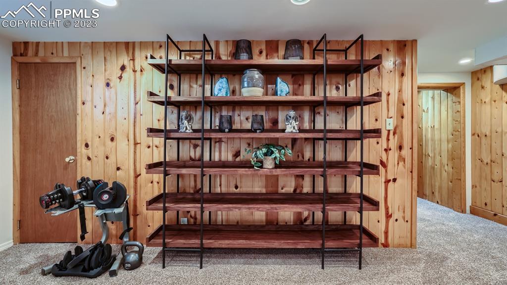 530 Valley Road Colorado Springs, CO 80904 - Photo 31 of 50 a living room with furniture a book shelf