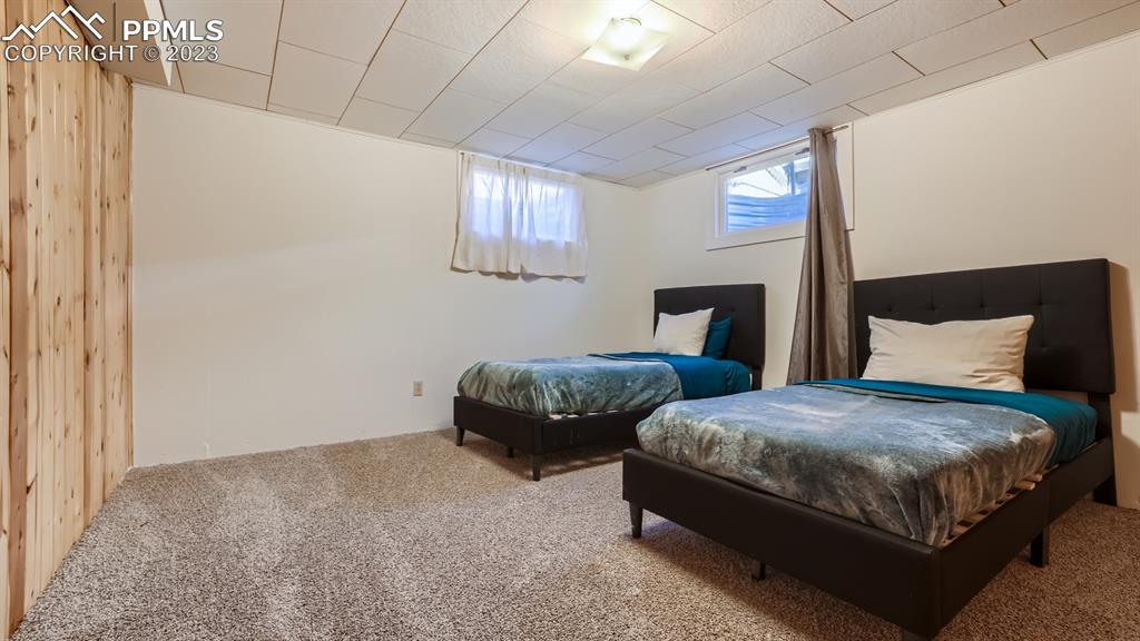 530 Valley Road Colorado Springs, CO 80904 - Photo 32 of 50 a bedroom with bed and a window