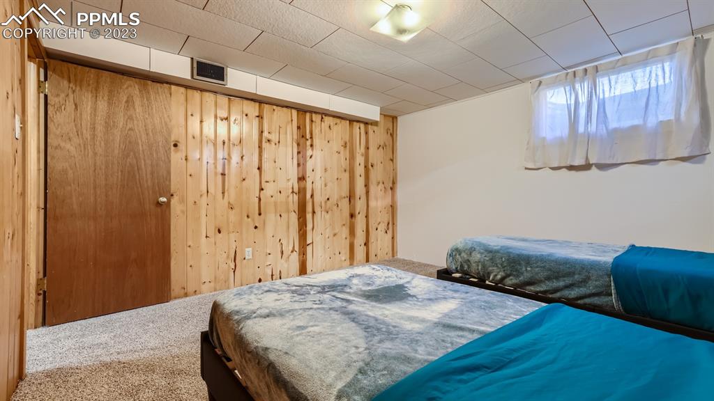 530 Valley Road Colorado Springs, CO 80904 - Photo 34 of 50 a bedroom with a bed and a window